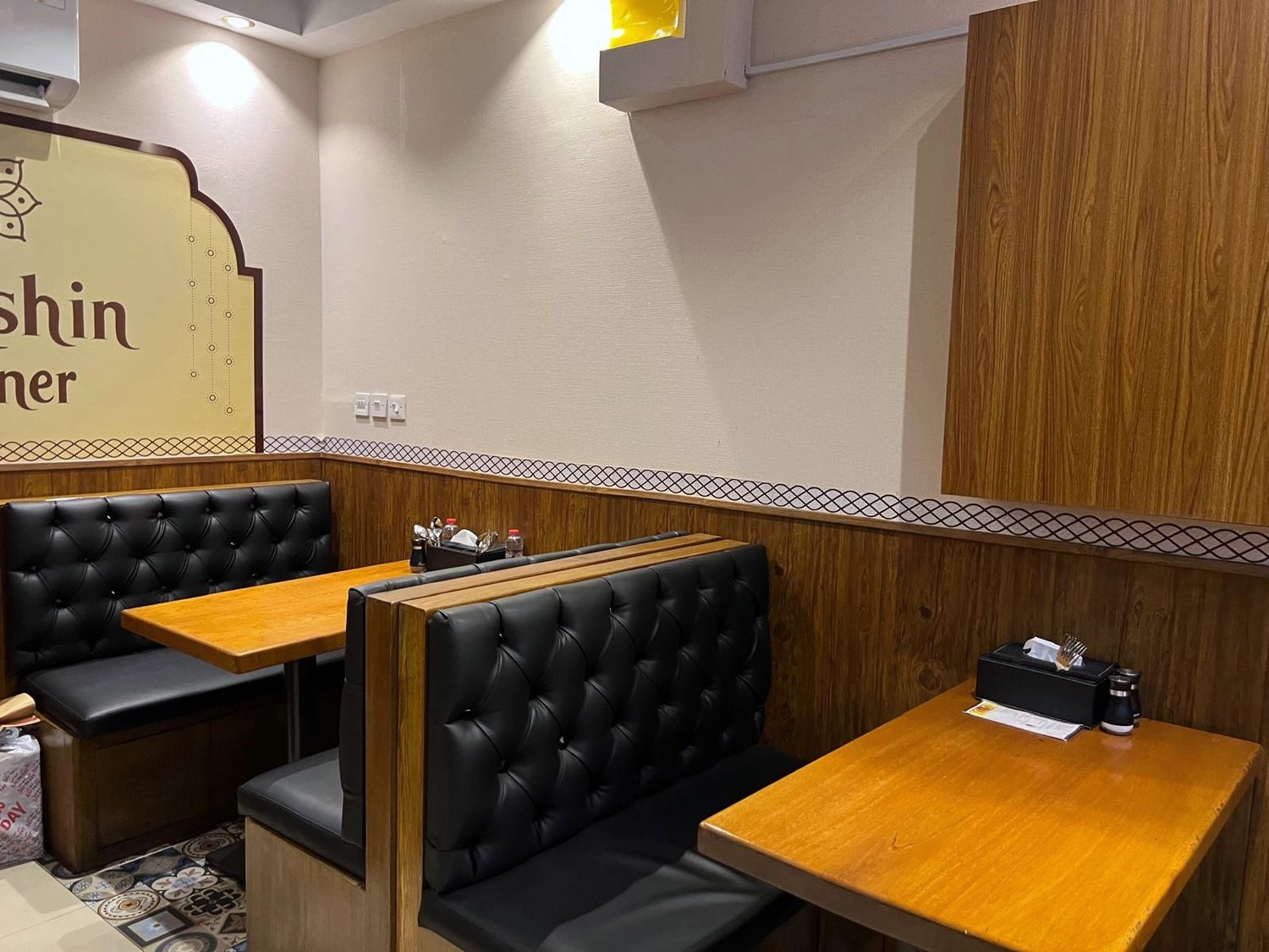 The booth seating at Dakshin Corner